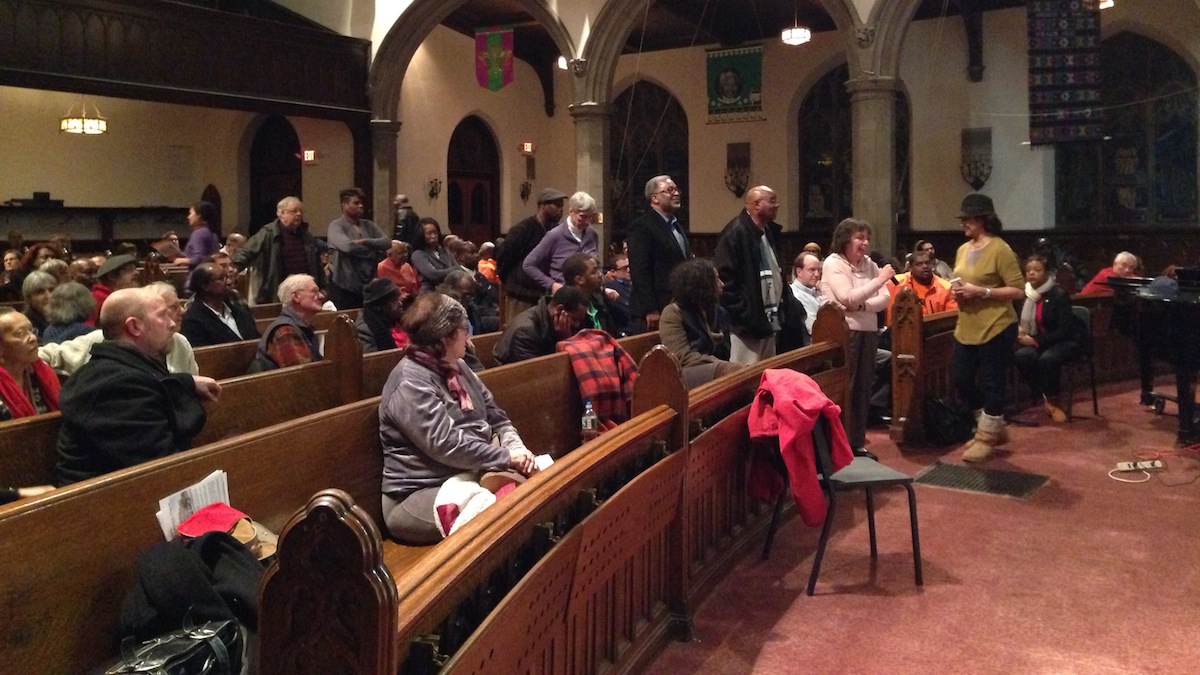  Attendees lined up to ask questions. (Alaina Mabaso/for NewsWorks)t 