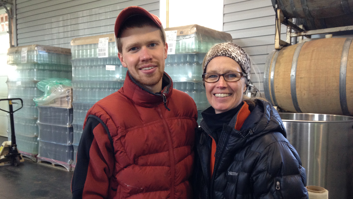 Tyler Bell and his mom Liz in the warehouse of Hopewell Valley Vineyards in Pennington