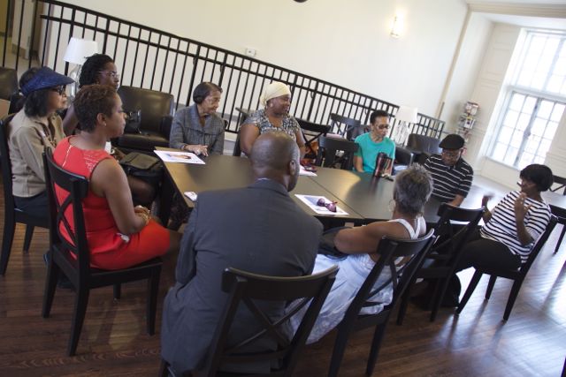  Local residents gather at Presser Senior Apartments to talk with one another and meet Councilwoman Cindy Bass. (Michelle Zei/for NewsWorks) 
