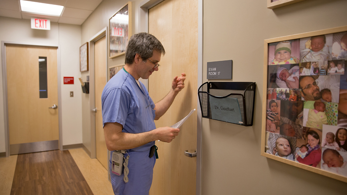 Dr. Gearhart moves from appointment to appointment at Pennsylvania Hospital. (Lindsay Lazarski/WHYY)