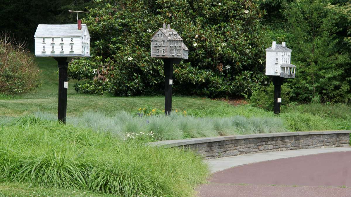  These birdhouses designed by Thomas F. Burke were based on Andrew Wyeth paintings and were displayed last year at the Morris Arboretum in Pennsylvania. Burke's houses on display along the Wilmington Riverfront were damaged by vandals. (Emma Lee/WHYY) 