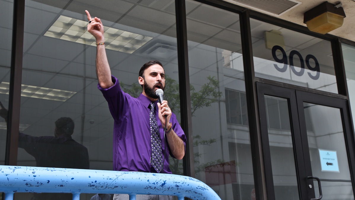  City Council candidate Nikki Allen Poe's campaign holds a protest outside the PPA's Parking Violations Branch on Filbert Street Friday afternoon. (Kimberly Paynter/WHYY) 
