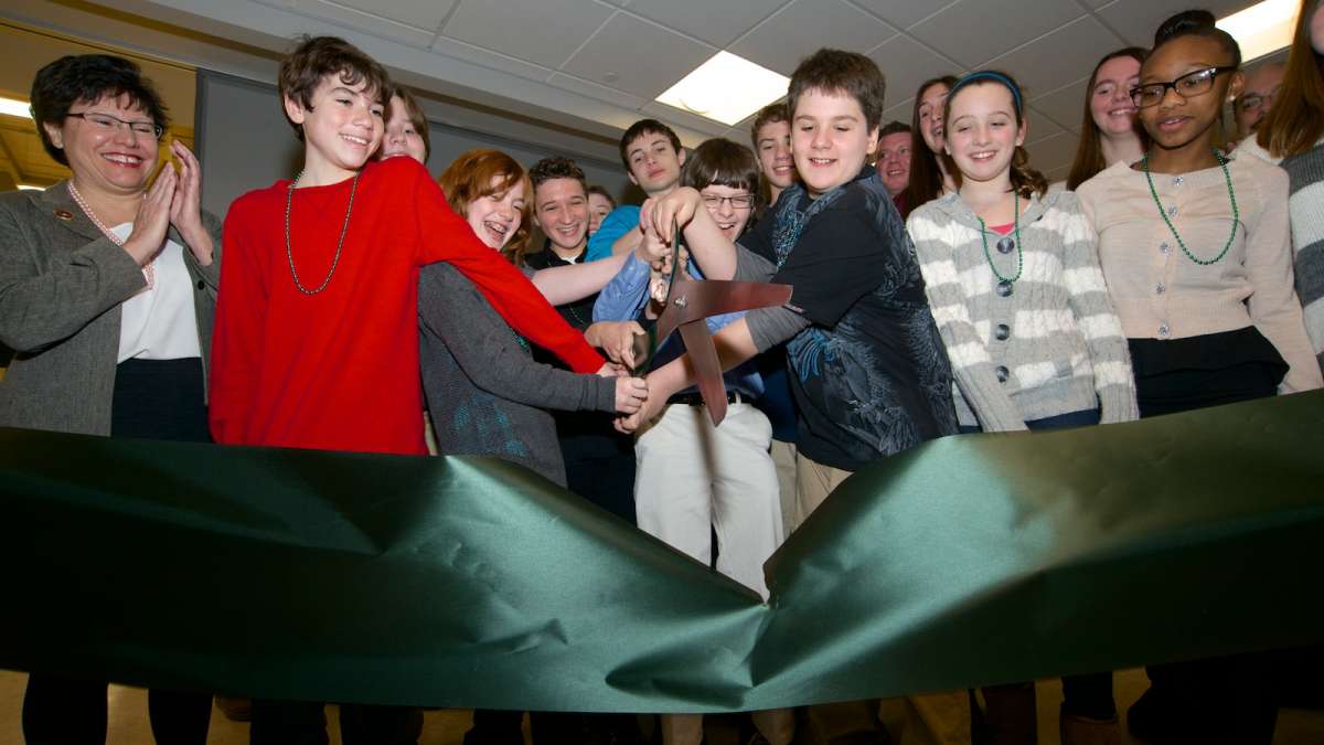  Students of the Green Woods Charter School cut the ribbon at their new facility on Monday. (Bas Slabbers/for NewsWorks) 
