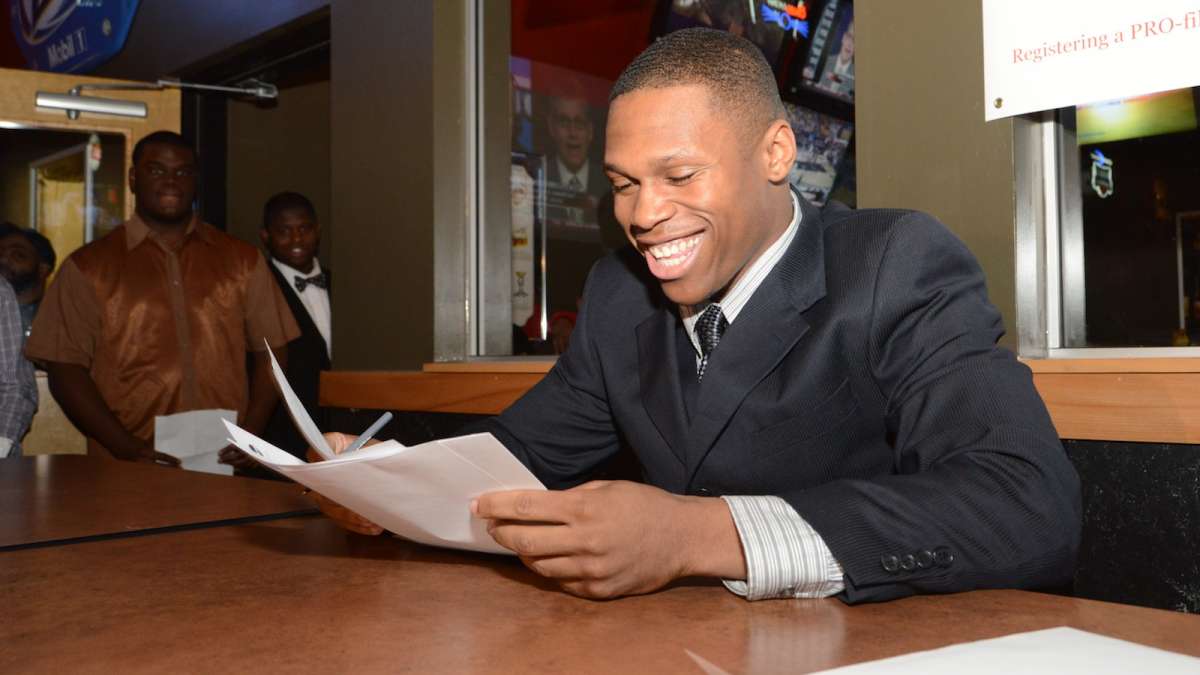  Imhotep captain DeAndre Scott signs a letter of intent to play at Arizona State University. (Bas Slabbers/for NewsWorks) 