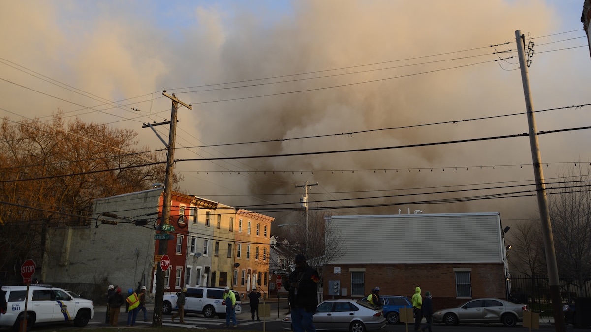 To make place for construction of 57 new rental units Philadelphia Housing Authority (PHA) demolished two of the three high-rises in the Sherwood neighborhood, on Saturday morning. (Bastiaan Slabbers/for NewsWorks)