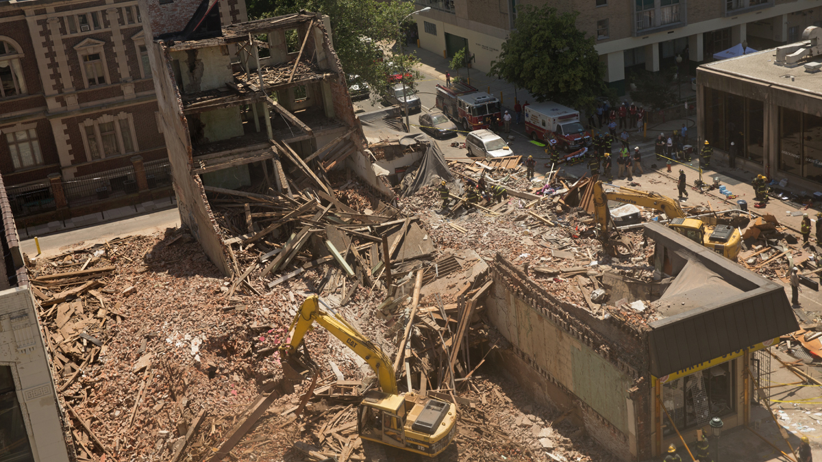  A four-story building collapsed onto the nearby Salvation Army Thrift Store at 22nd and Market Streets on Wednesday, June 5, 2013.  (Lindsay Lazarski/WHYY)  