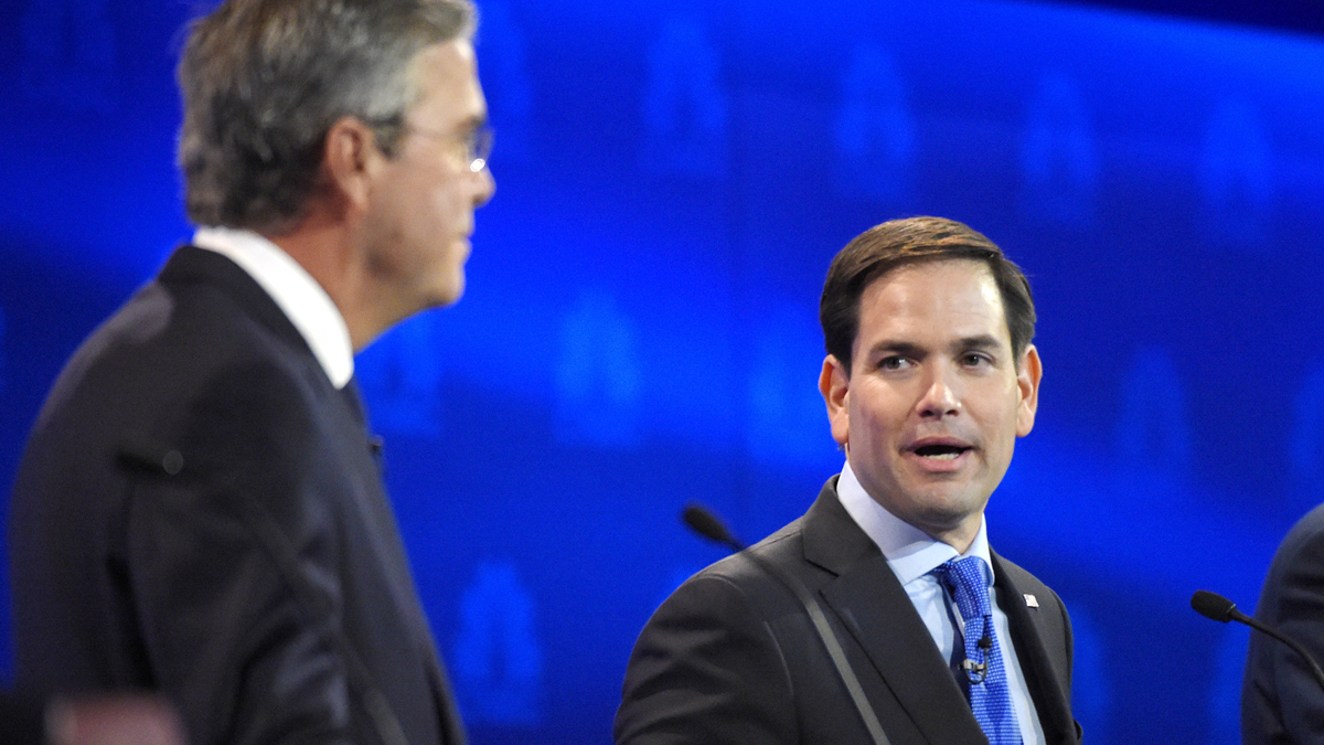  Marco Rubio, right, and Jeb Bush, argue a point during the CNBC Republican presidential debate at the University of Colorado, Wednesday, Oct. 28, 2015, in Boulder, Colo. (AP Photo/Mark J. Terrill) 
