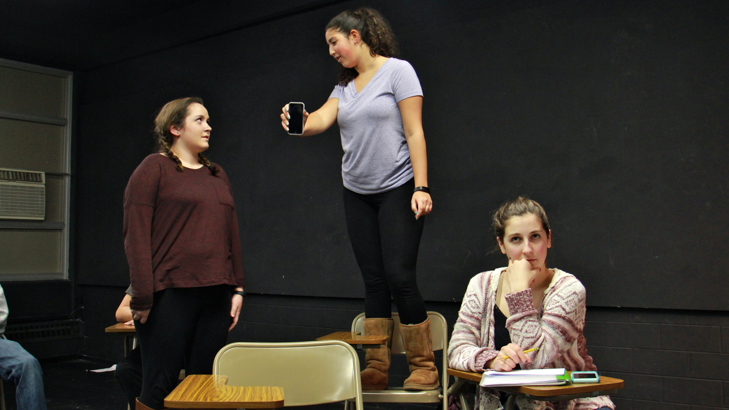 Young actors rehearse for the play 