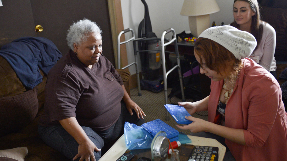  Members of the Camden Coalition team make a home visit in Camden in 2014. (Couresy of Lynsey Addario/Camden Coalition) 
