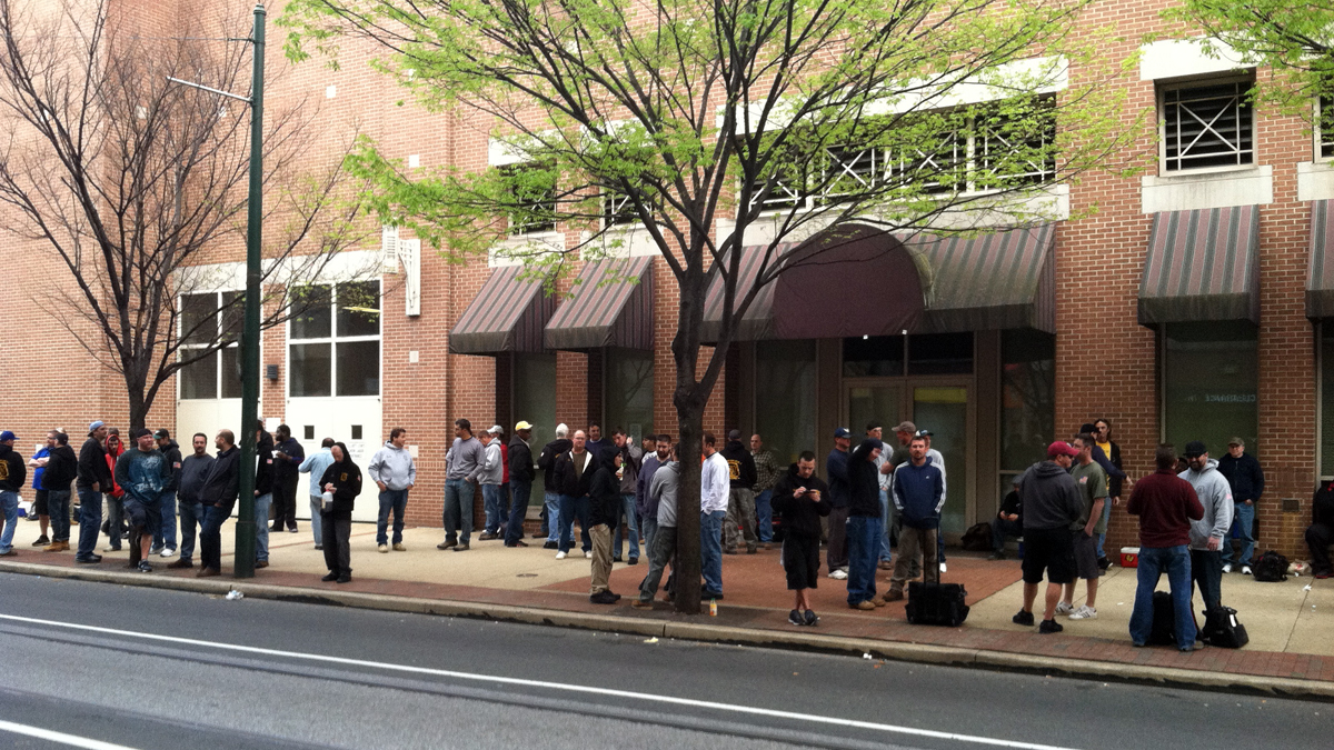  Members of the Carpenters Union protest outside  the Pennsylvania Convention Center in May, 2014 (NewsWorks file photo) 