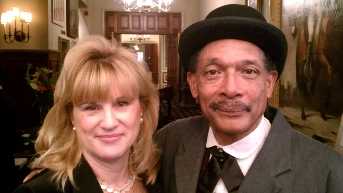  Catherine Cahill, president and CEO of the Mann Center, is shown with 