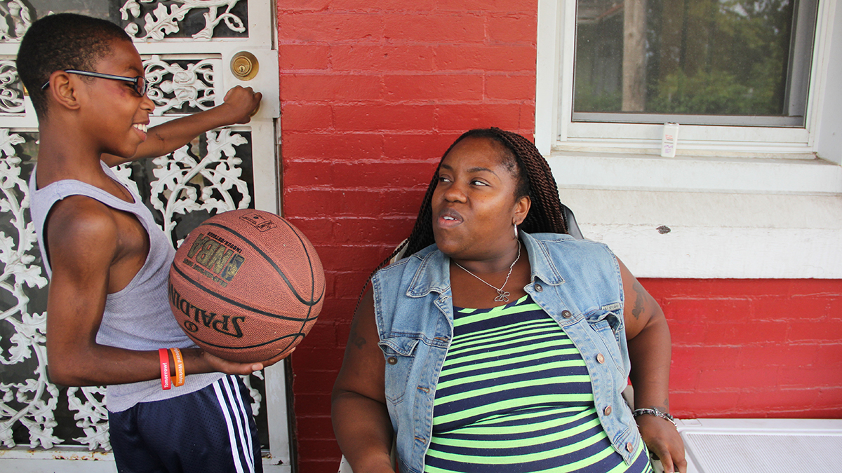 Rosalinda Harris worries that her son's medical needs aren't being met at Blaine Elementary. Her son,Chance Nelson,11, was born with a heart defect. (Emma Lee/WHYY) 