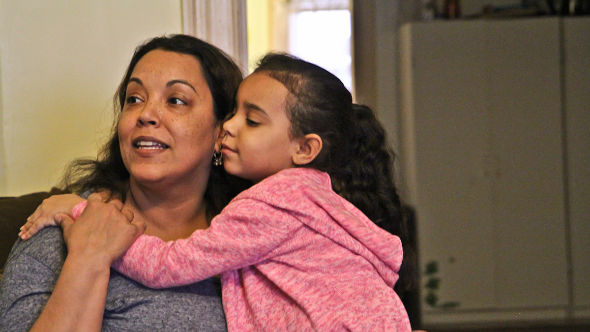  Wanda Thomas and her daughter Madeline, 5, will attend Wissahickon Charter School's lottery Thursday hoping to hear Madeline's number called. (Kimberly Paynter/WHYY) 