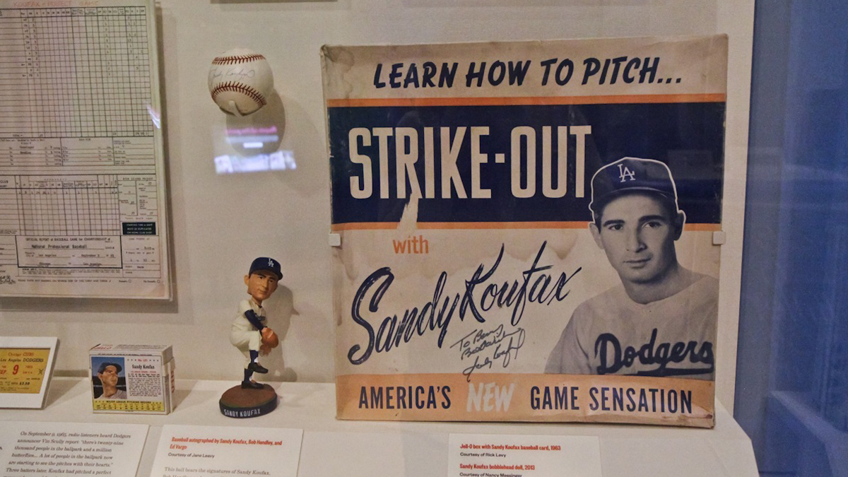  A display case of Sandy Koufax fan-fare is on display at the NMAJH exhibit, Chasing Dreams. (Kimberly Paynter/WHYY) 