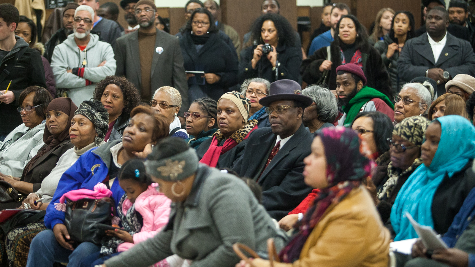 Hundreds attend a community meeting concerning neighborhood safety in Cobb's Creek following the shooting of Philadelphia Police Officer Jesse Hartnett last week. (Brad Larrison/for NewsWorks)
