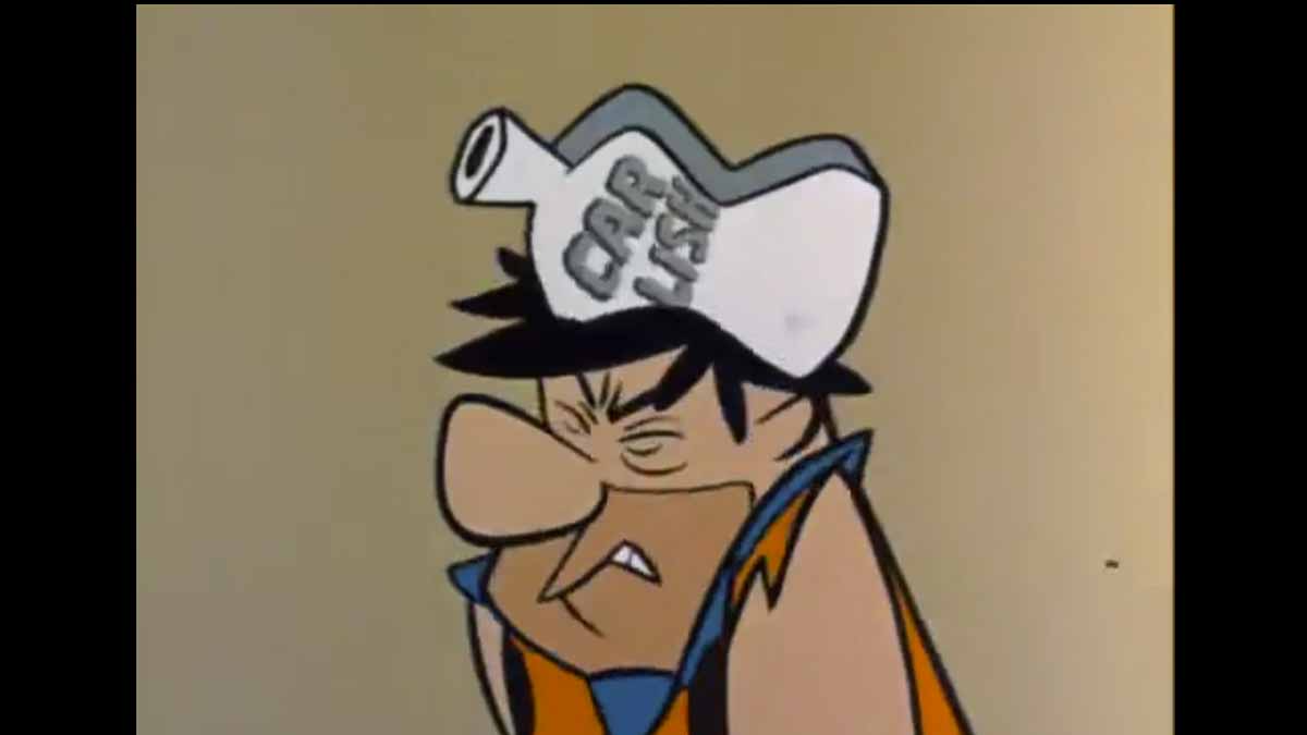 In season 1 episode 5 of The Flintstones, Fred gets conked on the head (as pictured here) and it completely changes his personality. A second conk later on reverses it. (Screen grab of The Flintstones)