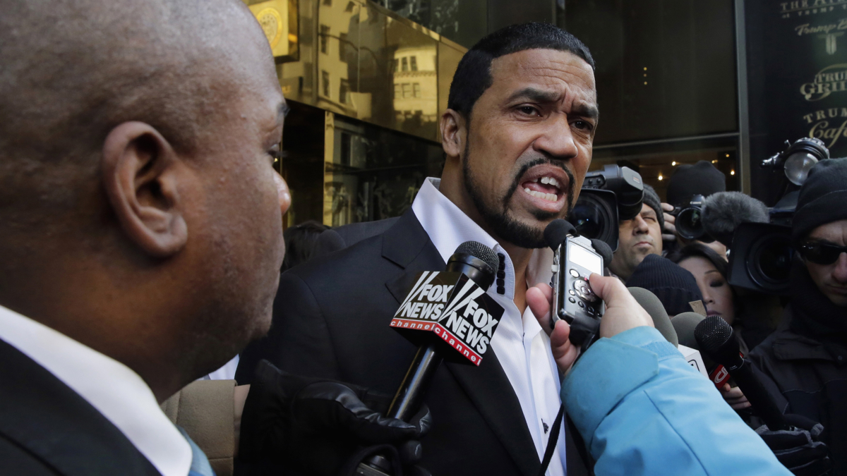  Pastor Darrell Scott speaks to the members of the media outside Trump Tower in New York, Monday, Nov. 30, 2015.   (AP Photo/Richard Drew) 