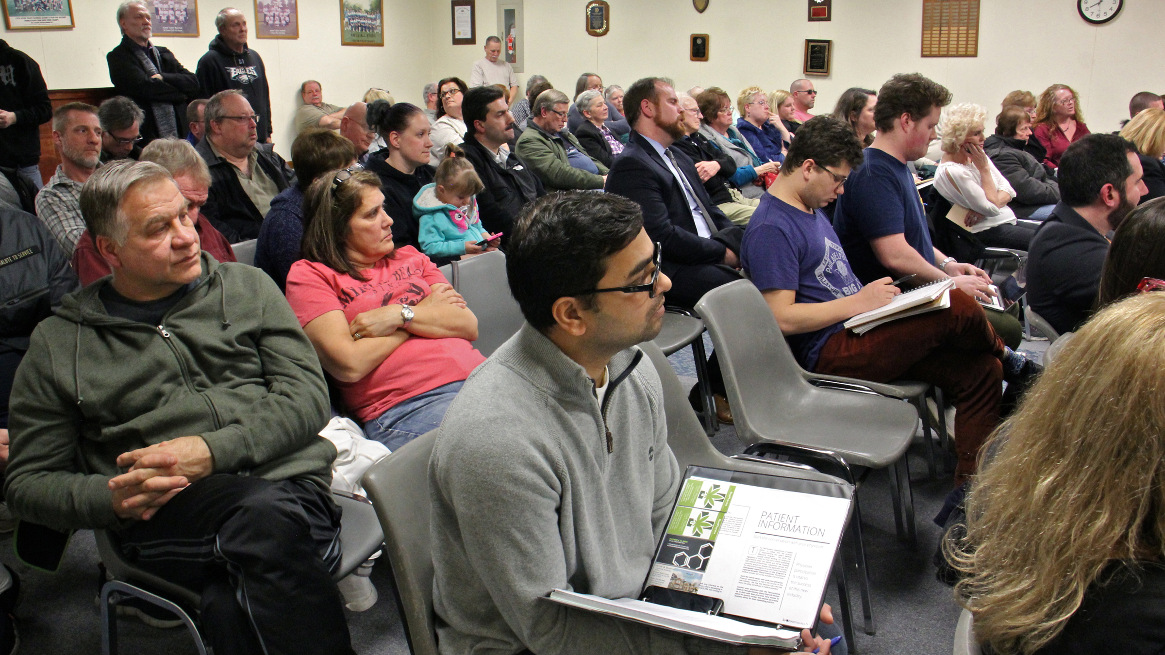 About 75 people crowd the meeting room at Aston Township Municipal Building for a public hearing on an ordinance that would regulate the growing of medical marijuana in the township. (Emma Lee/WHYY)
