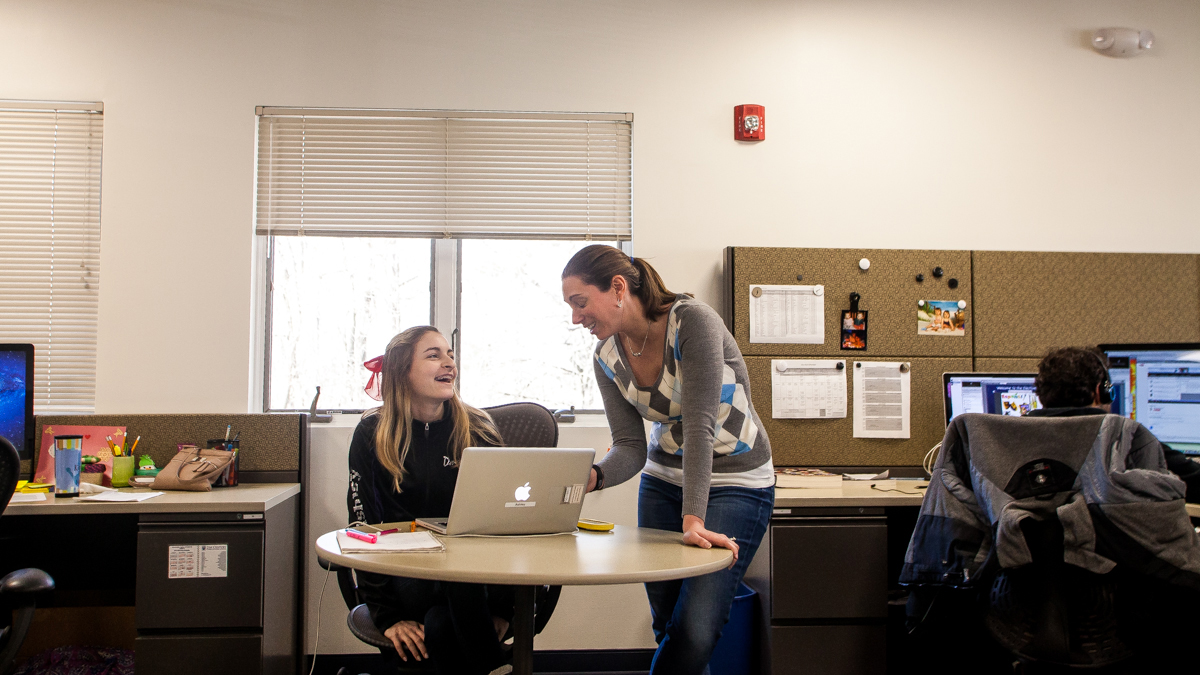  Eighth grader Ashley Mango works on math with her teacher Thrisha Miller. Mango goes into 21st Century Cyber Charter about once a week for in-person help. She said she likes the perks of doing school work at home in her pajamas. (Brad Larrison/for NewsWorks) 