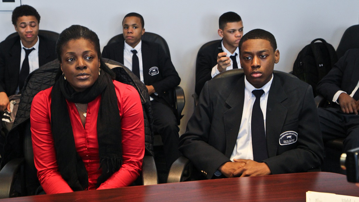  Police arrested Darrin Manning, 16, (right) while on his way to a school basketball game January 7, 2014. Manning's mother, Ikea Coney (left) and others are asking DA Seth Williams to drop the charges. (Kimberly Paynter/WHYY) 
