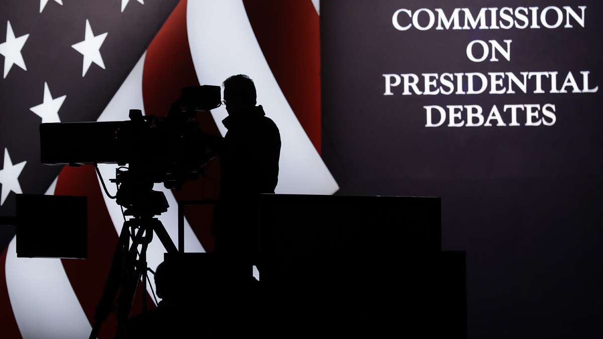 A television camera operator tests his position during a rehearsal for the third presidential debate between Republican presidential nominee Donald Trump and Democratic presidential nominee Hillary Clinton at UNLV in Las Vegas