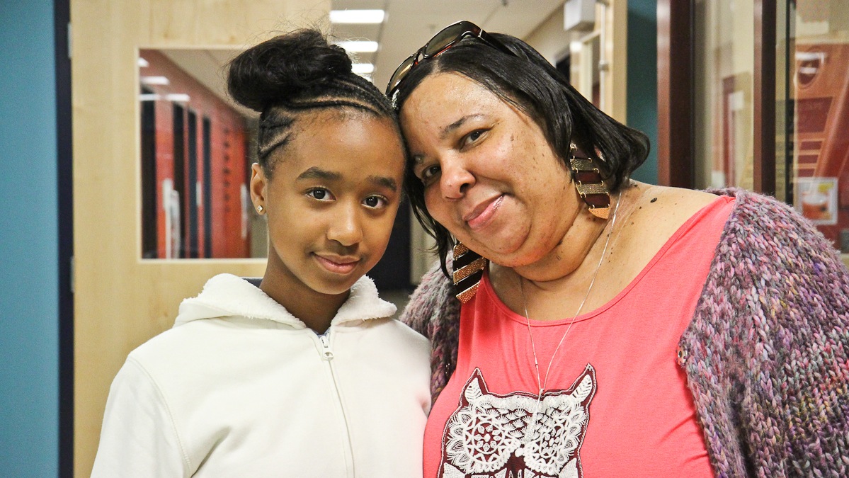Alyse Nichols helps her grandmother