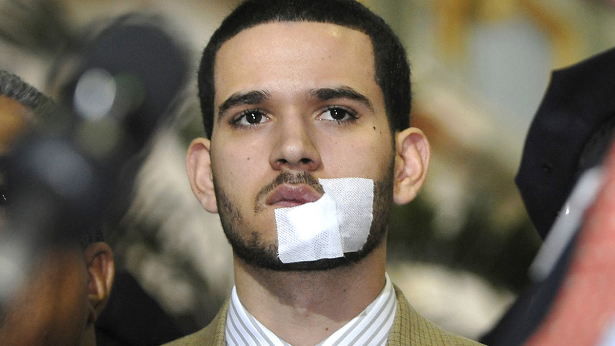  Former Philadelphia police officer Richard DeCoatsworth, who was hailed as a hero and sat next to Michelle Obama at a presidential address will stand trial on charges he raped two prostitutes at gunpoint. The November trial comes after the 28-year-old DeCoatsworth withdrew a plea to reduced charges Tuesday, April 1, 2014. (AP file  Photo/Jason Minick) 