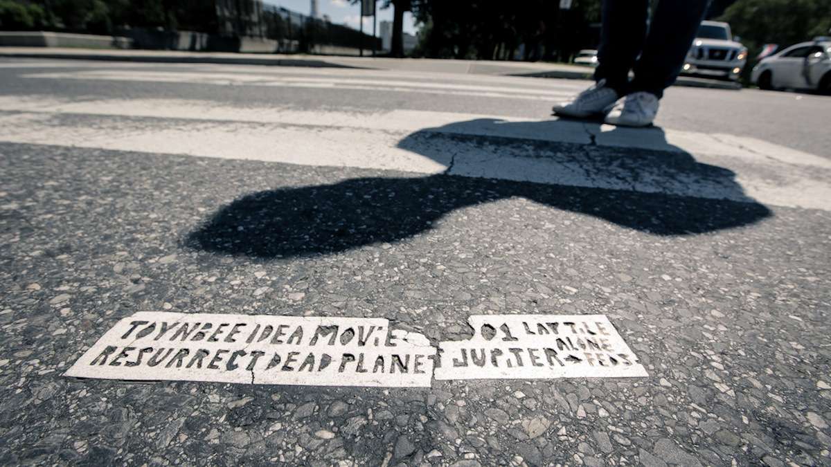  Raj Haldar stands in front of a recent tile near Logan Circle, Philadelphia. (Image courtesy of Weathervane Music/Peter English Photo) 