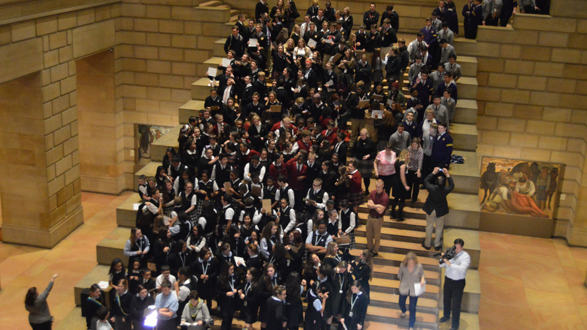  Students from schools throughout the Philadelphia Archdiocese crowd the Museum of Art steps and cheer details of the September visit of Pope Francis. (Tom MacDonald/WHYY) 