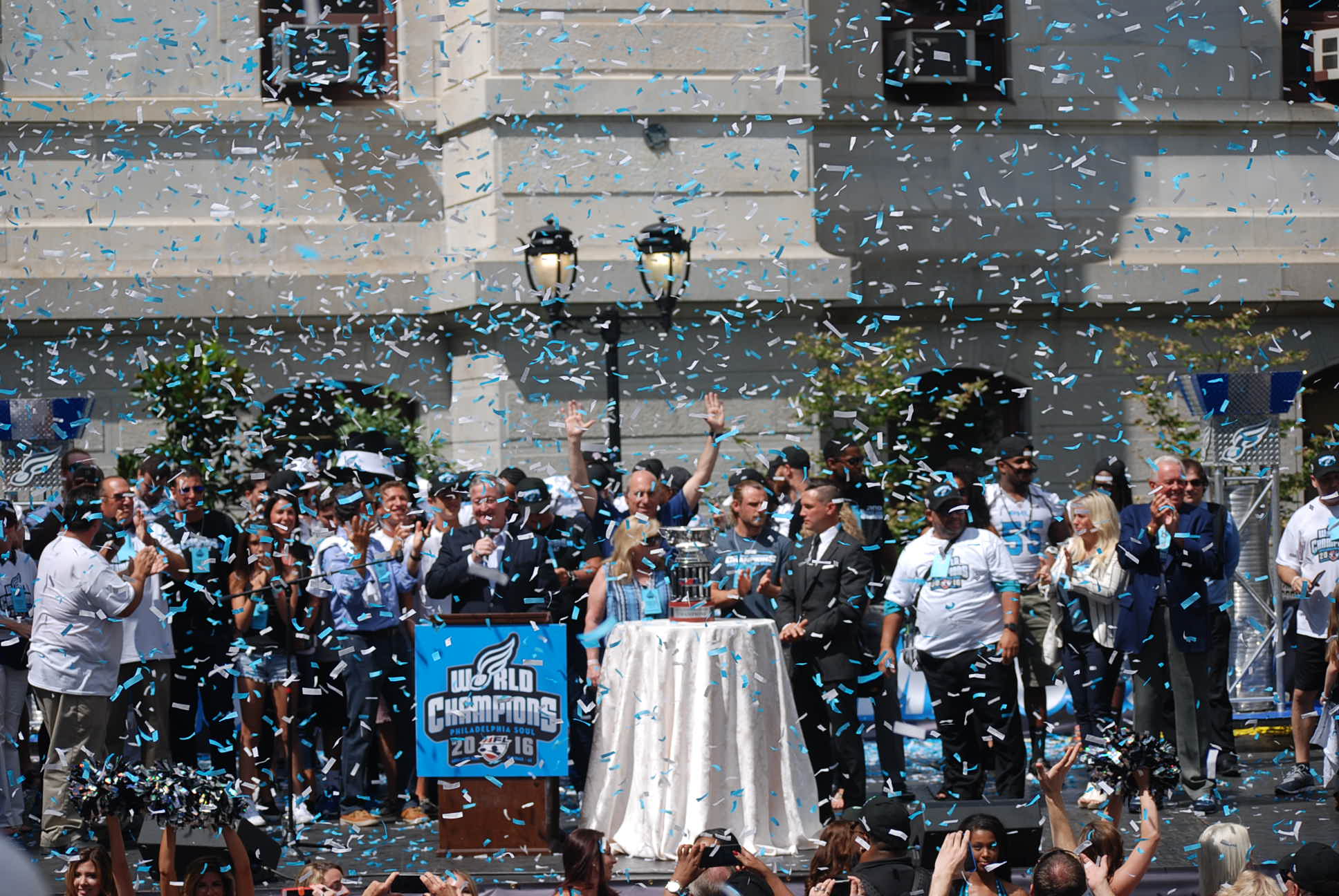 Confetti flies as the Soul players and supporters celebrate the arena football team's championship win. (Tom MacDonald/WHYY)