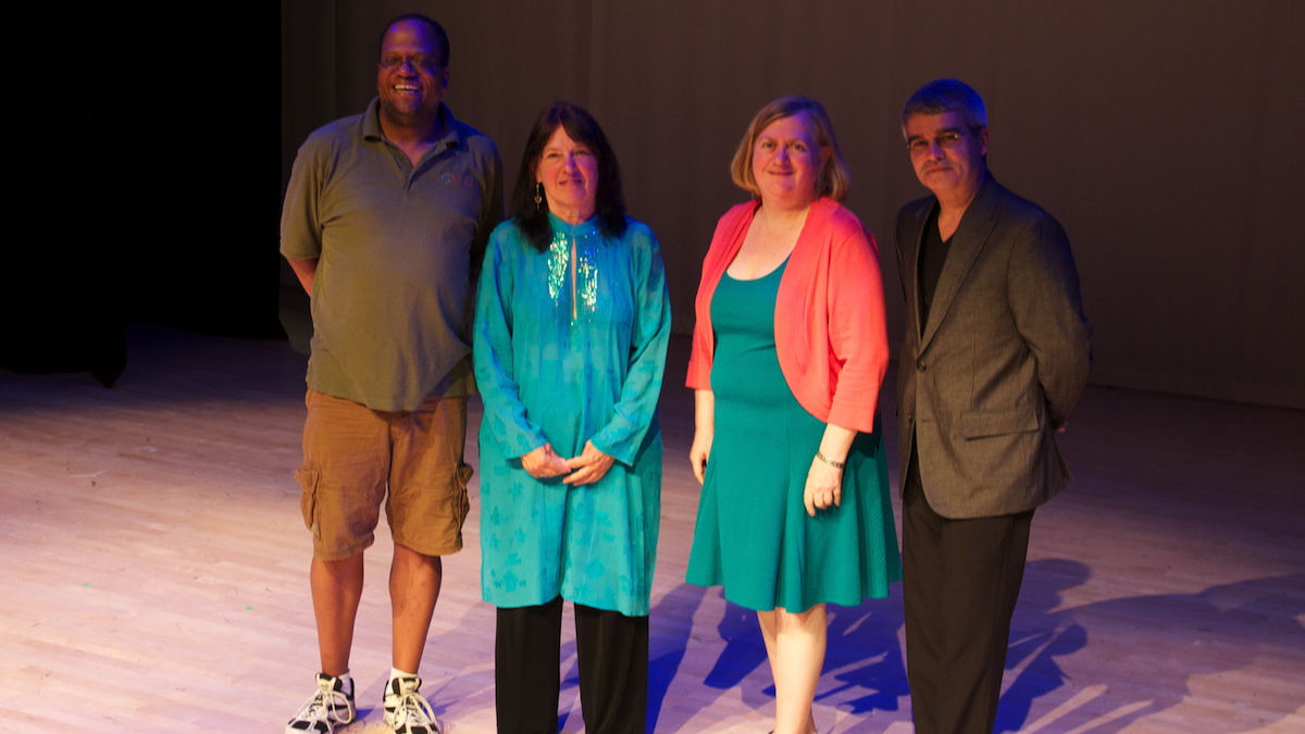  (L to R) Vice President Milo Morris; President and General Manager Sandra Day; board member Susan Millsfarrington; and music director Louis Menendez. (Greta Iverson/for NewsWorks) 