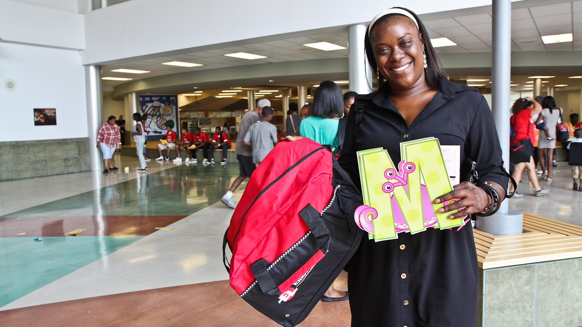  Mom Monique Williams attended E! Day: Back to School Expo Friday at the School of the Future.(Kim Paynter/WHYY) 