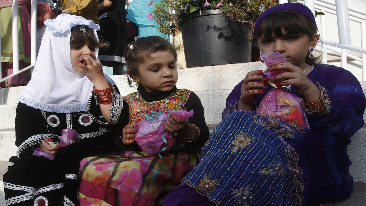  American Muslim children in New York City are shown at a Muslim community center marking the Eid al-Fitr holiday.  (AP Photo/Pavel Rahman) 