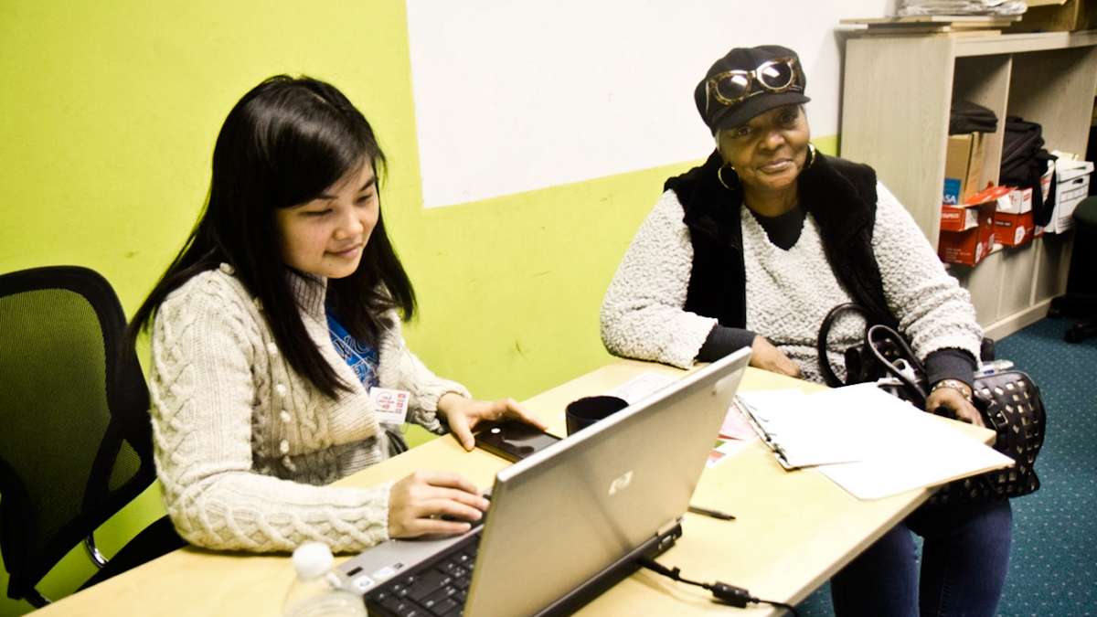 Rosalyn Sanders (right) received the Federal Earned Income Tax Credit in 2015. (Kimberly Paynter/WHYY)