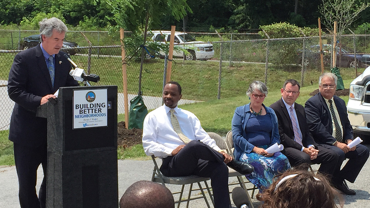  Wilmington will receive a $192,300 grant to place residents in environmental jobs. From left to right: Shawn Garvin, regional administrator for the EPA, Councilman Darius Brown, Marjorie Croft, director of the Division of Hazardous Waste for DNR, Paul Morris, assistant vice president for workforce development and community education at Del Tech, and Paul Calistro, executive director of the West End Neighborhood House. (Zoe Read/WHYY)  