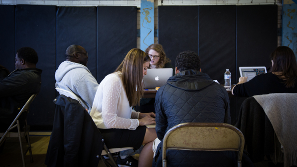  Ex-offenders attend an expungement clinic at Vare Recreation Center in November. Those who meet certain requirements are eligible to have prior arrests and convictions expunged from their legal record. These services are provided by volunteer attorneys and are free of charge. (Emily Cohen for NewsWorks) 