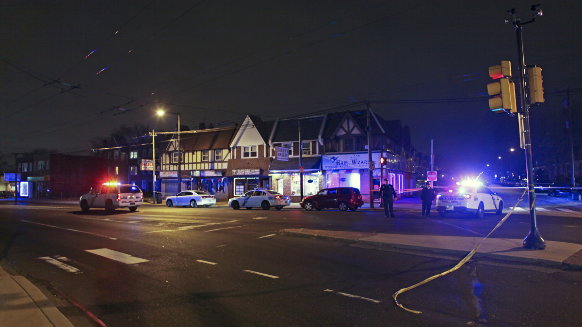  Investigators gather at the scene of a fatal shooting in the Mayfair section of Philadelphia. (AP Photo/ Joseph Kaczmarek) 
