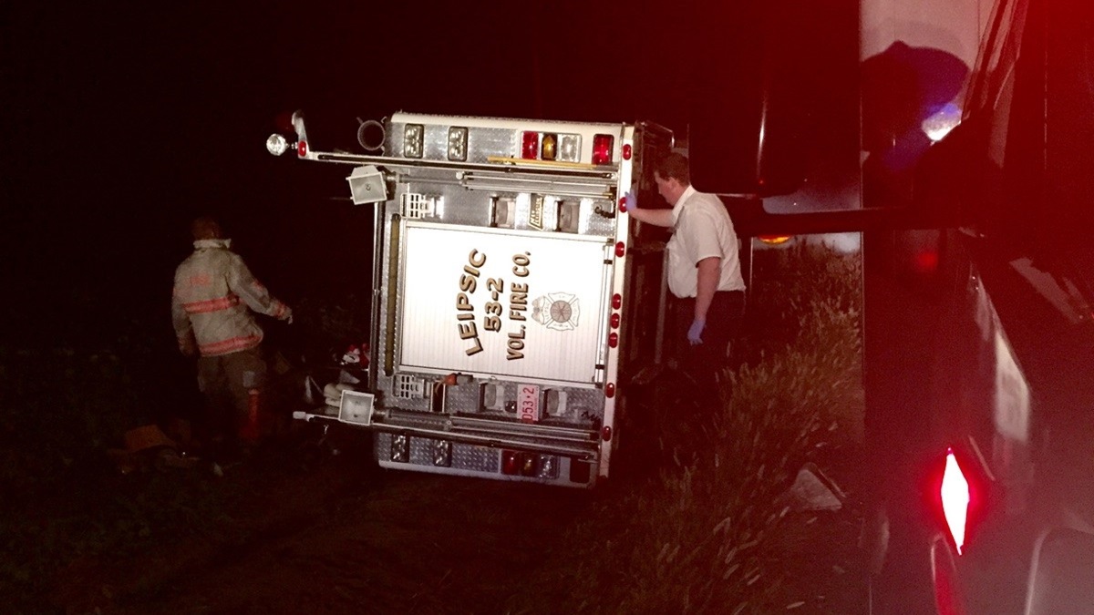 The Leipsic fire truck rests on its side after overturning early Sunday morning. (photo courtesy Del. State Police)