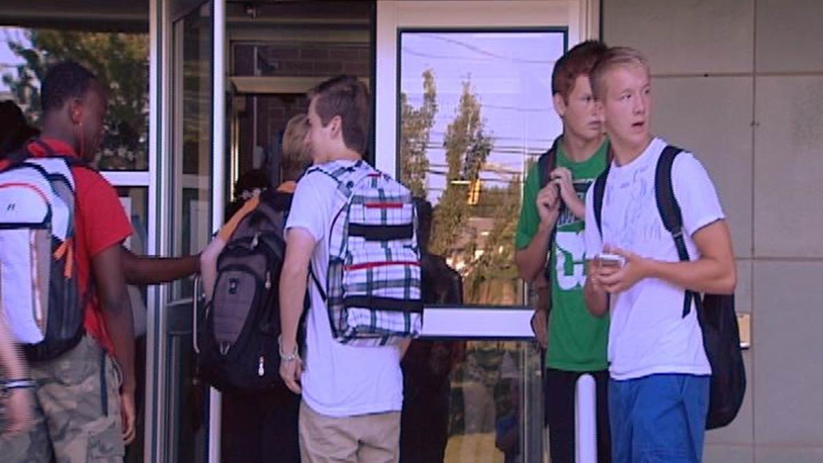  Students wait to enter Brandywine High for the first day of school. (Charlie O'Neill/WHYY) 