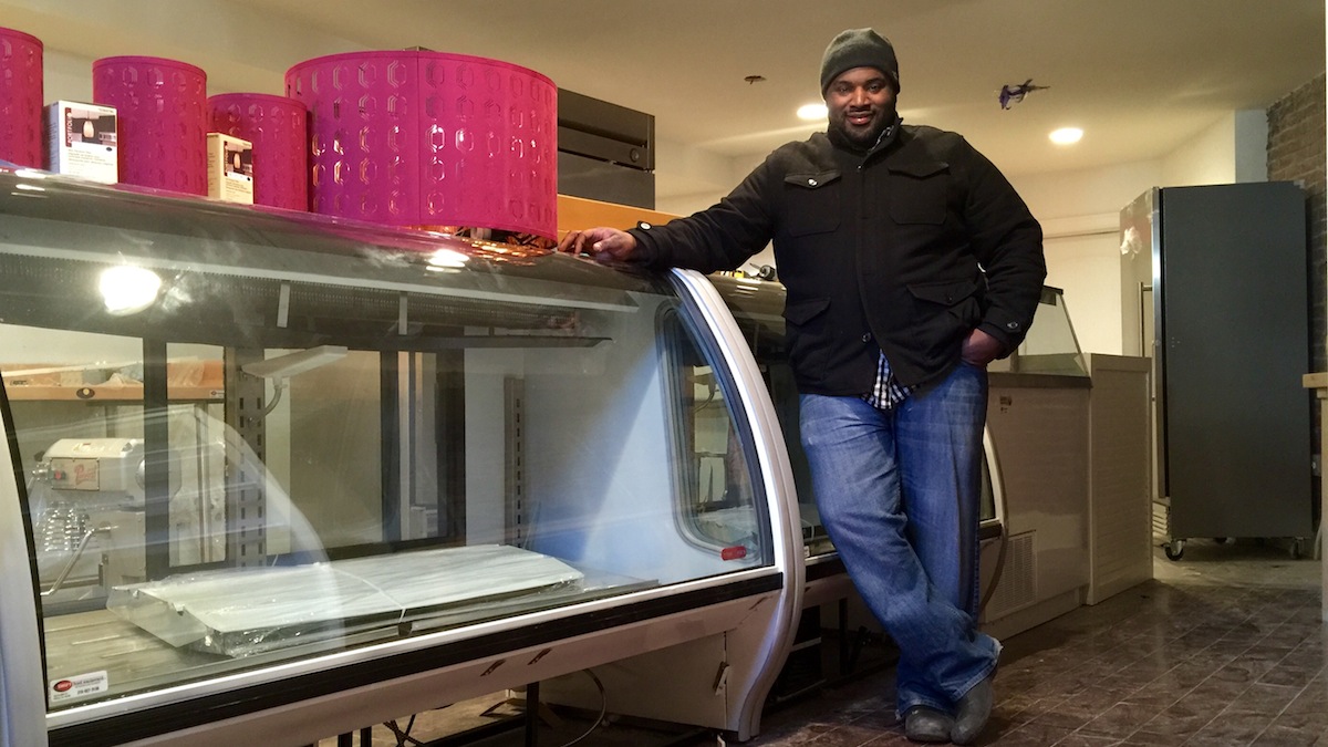  Jimmie Reed stand inside Little Jimmie's Bake House.  Renovations are nearly complete and he plans to open next month.  (Jana Shea/ for NewsWorks) 
