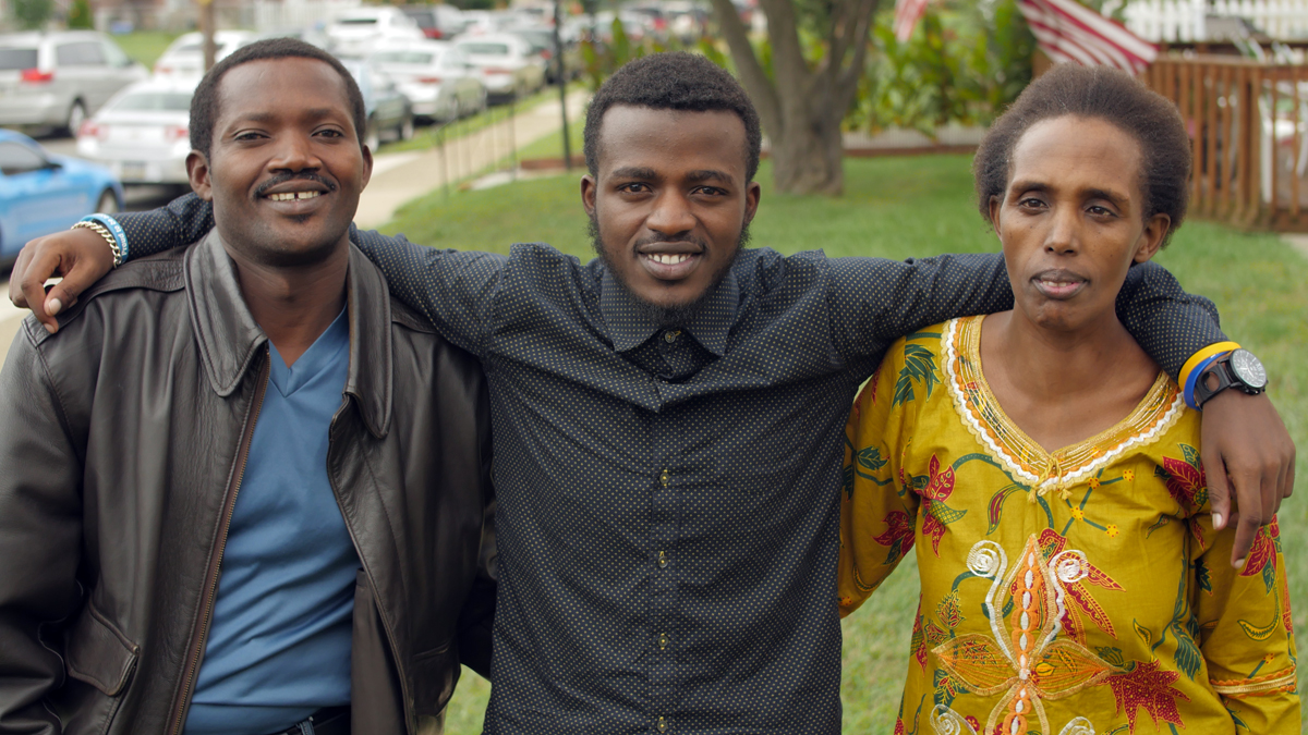 Gentil Ndizihiwe is shown with his parents. (Image courtesy of JEVS Human Services)