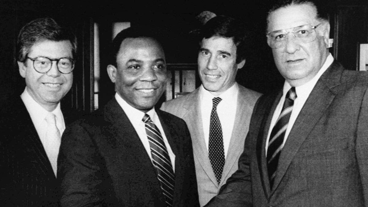  W. Wilson Goode and Frank Rizzo (foreground) are shown shaking hands in the midst of Philadelphia's 1983 Democratic mayoral primary race. After losing, Rizzo put his support behind Goode, a move that Republican mayoral candidate John Egan said led to a lucrative position for Rizzo at Philadelphia Gas Works. (AP Photo/Cliff Hence, file) 