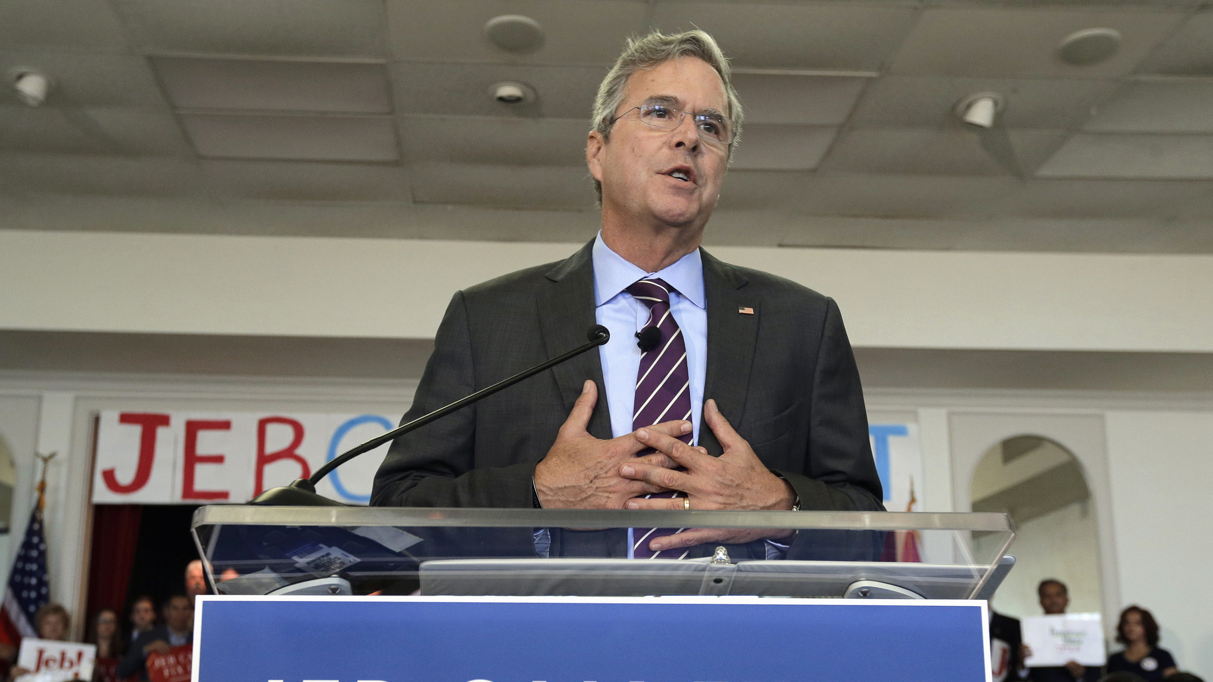  Republican presidential candidate Jeb Bush gestures as he speaks to supporters during a rally Monday, in Tampa, Florida. (AP Photo/Chris O'Meara) 