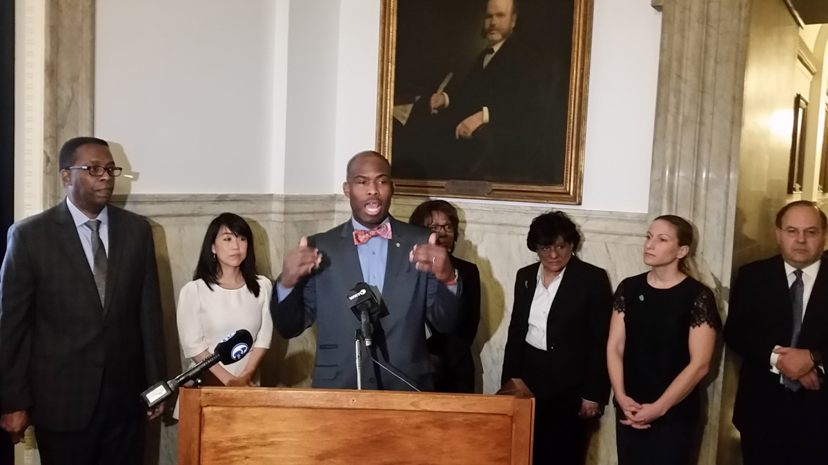 Councilman Derek Green discusses his idea to add solar panels to Philadelphia's public schools. (Tom MacDonald/WHYY)