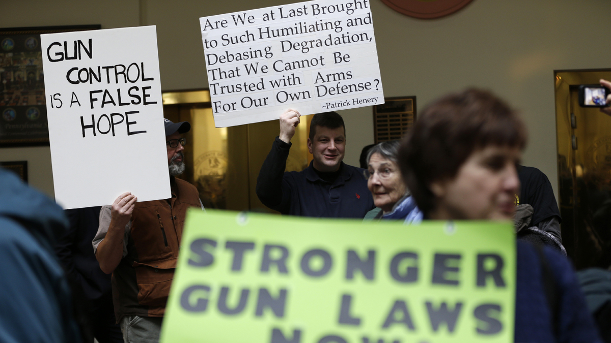  Gun rights and gun control advocates demonstrate in the Pennsylvania Capital building in this January 2013 photo. (Matt Rourke/AP Photo) 