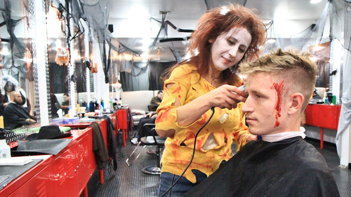  Hair stylist Ruki took more than Kevin Breen bargained for at the Chop Shop's Halloween event to benefit UNICEF. (Kimberly Paynter/WHYY) 