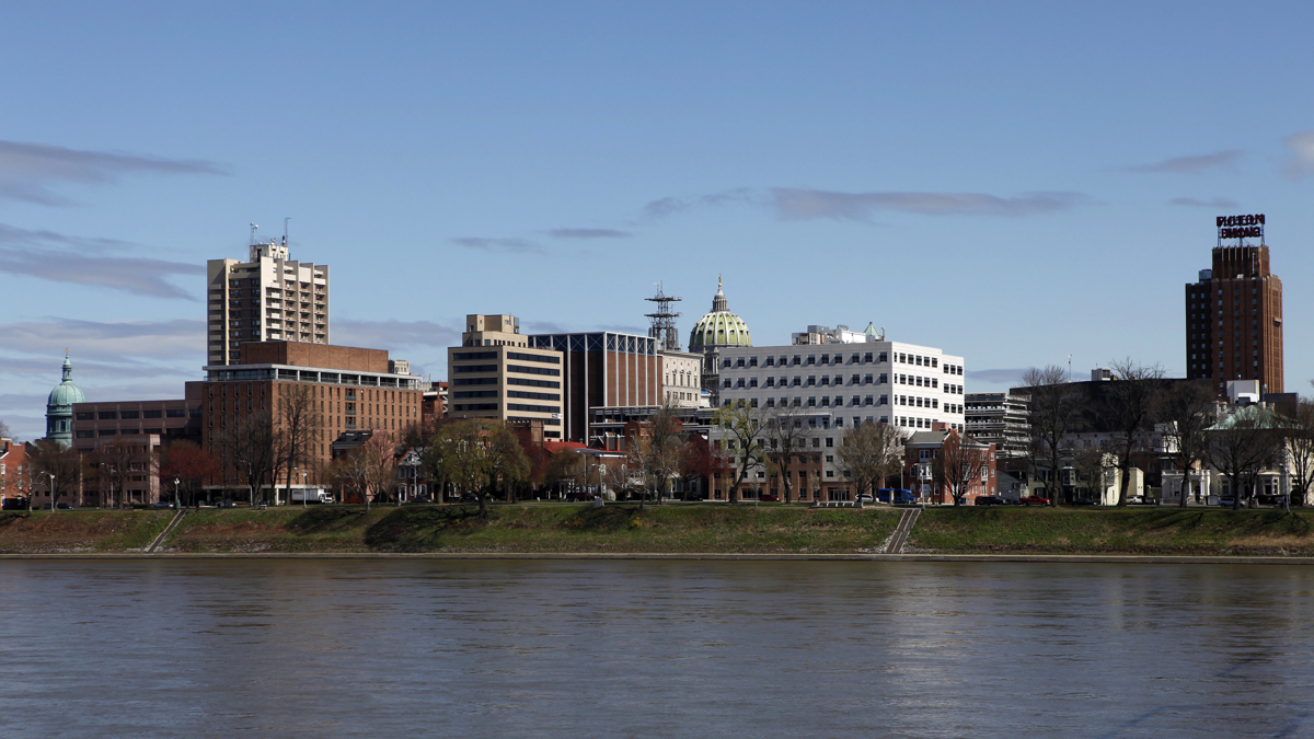  The city of Harrisburg, Pa., is seen along the banks of the Susquehanna River. Experts estimate 40 percent of Pennsylvanians live in a distressed community. (AP Photo/Carolyn Kaster) 