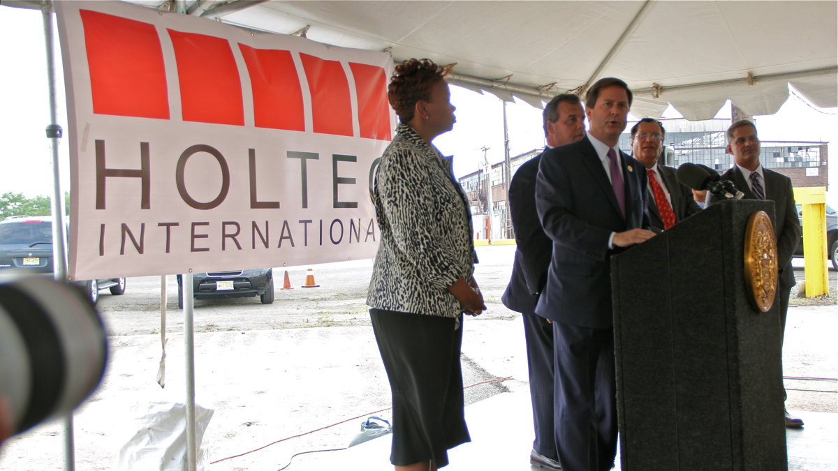  Gov. Chris Christie and Camden Mayor Dana Redd greet Krishna Singh, president of Holtech, who says he will bring jobs to Camden in exchange for up to $260 million in tax incentives. (Emma Lee/WHYY) 