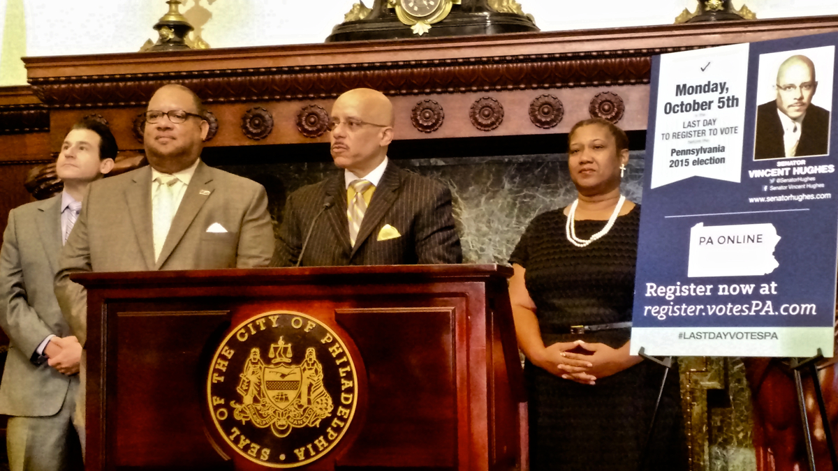  State Sen. Vincent Hughes urges Pennsylvania voters to register online during a press conference at City Hall. (Katie Colaneri/WHYY) 
