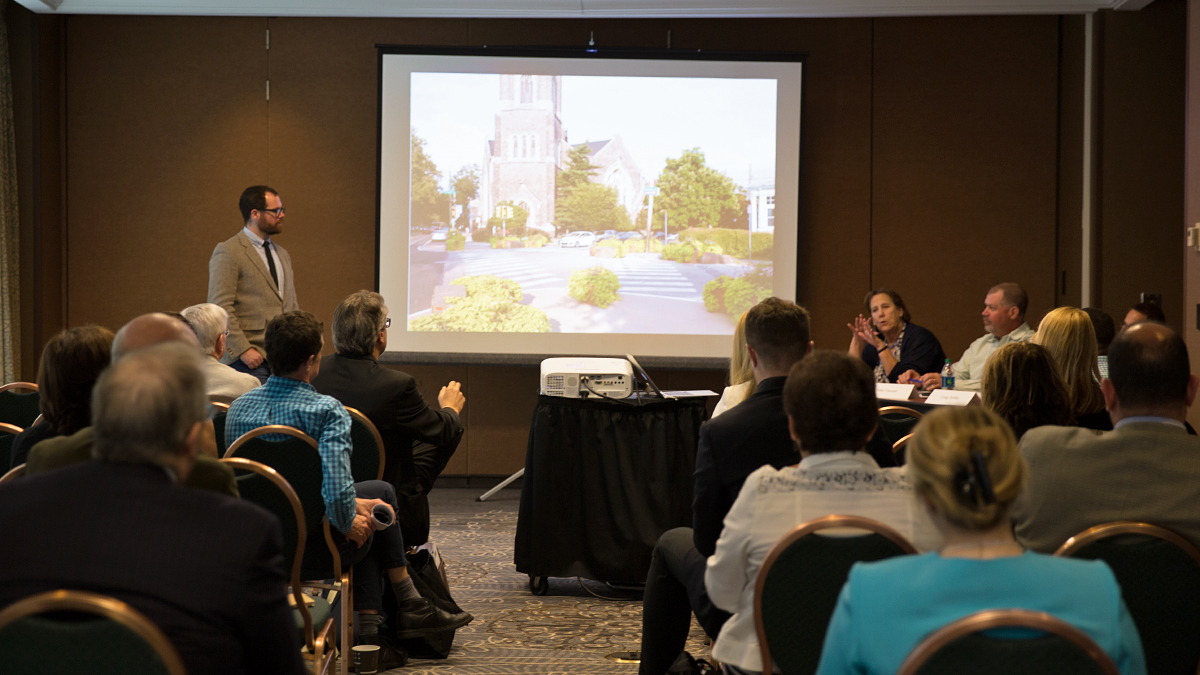  Panelists Rina Cutler, Toby Fauver, and Craig Peiffer discuss complete streets design for vehicles, pedestrians, and bicyclists, as well as inexpensive projects cities like Reading and Philadelphia have tried in the past at the inaugural Keystone Crossroads conference Urban Ideas Worth Stealing.  (Lindsay Lazarski/WHYY) 